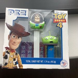 Toy Story 4 Candy Dispenser Set - Woody, Buzz Lightyear, and Alien. Unopened.